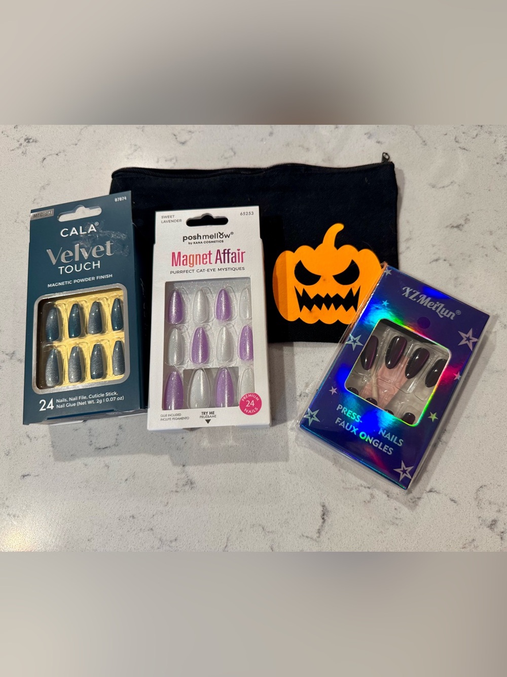 3 packages of nails and Halloween pouch